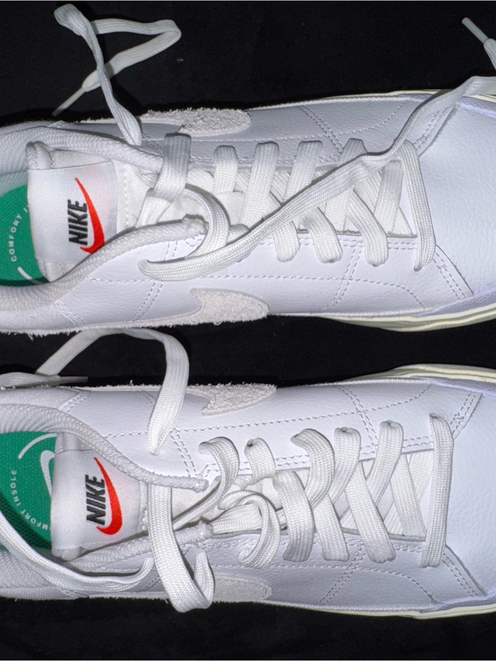 Nike White Sneakers with Red Swoosh